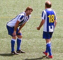 Pochettino (left) playing for Espanyol in a veterans' match in 2011