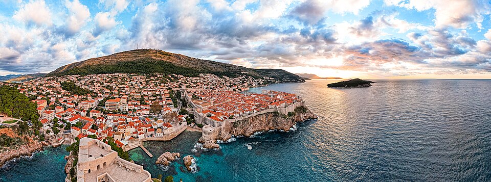 Panorama of Dubrovnik during sunrise and island of Lokrum