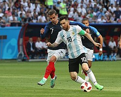 Messi battling past Antoine Griezmann of France at the 2018 FIFA World Cup
