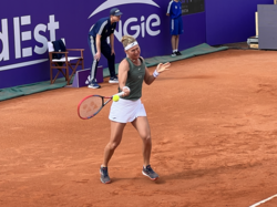 Bouzková hits a forehand in Strasbourg in 2024.