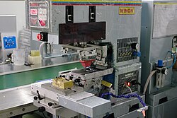 A manufacturing device typical of light industry (a print machine).