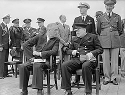 Churchill and Roosevelt seated on the quarterdeck of HMS Prince of Wales for a Sunday service during the Atlantic Conference, 10 August 1941