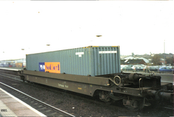 P&O Nedlloyd intermodal container in a tiphook intermodal freight well wagon at Banbury station. England, 2001