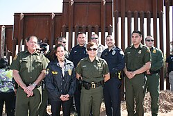 Harris as Attorney General of California at the border in 2011 to discuss strategies to combat transnational gang crime