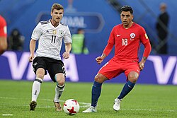 Chile vs Germany at the 2017 FIFA Confederations Cup final. Gonzalo Jara and Timo Werner in front.