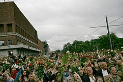 Town Hall Square in Oslo filled with people with roses mourning the victims of the Utøya massacre of 22 July 2011.