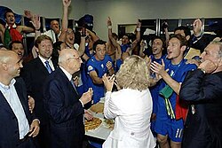 Totti (right), President of Italy Giorgio Napolitano and the team celebrate victory in the 2006 World Cup