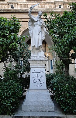 The statue of Saint Elias in the church yard