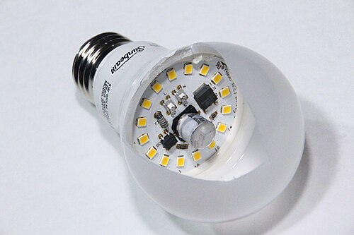Household LED lamp with its internal LED elements and LED driver circuitry exposed