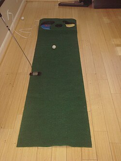 Indoor putting green for practice and instruction