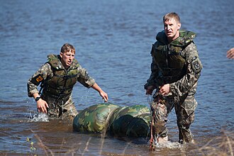 U.S. Army Capt. James McClare and 1st Lt. Anthony Day participating in the 2016 Best Ranger Competition.