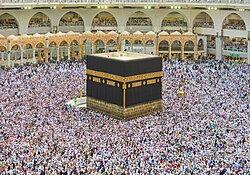The Kaaba in Masjid al-Haram, Mecca, Saudi Arabia, during the Hajj season. Muslims face towards the Kaaba while performing Salah