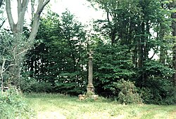 Memorial cross said to mark the spot where King Malcolm III of Scotland was killed while besieging Alnwick Castle in 1093.