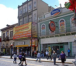 Deterioration of historic buildings in the city center due to heavy visual pollution