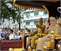 Hassanal Bolkiah and Pengiran Anak Saleha being transported in the royal chariot on 5 October 2017