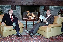 Soviet General Secretary Mikhail Gorbachev, who sought to end the Cold War between the Soviet-led Warsaw Pact and the United States-led NATO and its other Western allies, in a meeting with President Ronald Reagan