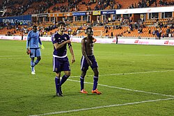 Kaká, Kevin Molino (foreground), and Donovan Ricketts (background) after a match against Houston Dynamo FC in 2015