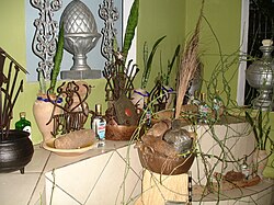 The assamentos, or sacred objects in which the orixá lives, stored in a bakisse inside a terreiro
