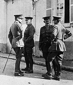Haig (left) with Major-General Charles Monro (GOC 2nd Division), Brigadier-General John Gough (Haig's BGGS), and Brigadier-General E. M. Perceval (commanding the 2nd Division's artillery) in a street in France, 1914.