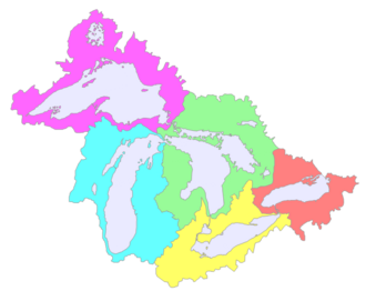 A map of the Great Lakes Basin showing the five sub-basins. Left to right they are: Superior (magenta); Michigan (cyan); Huron (green); Erie (yellow); Ontario (red).