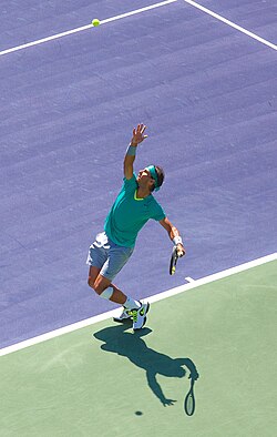 Nadal serving at the Indian Wells Open in 2013.
