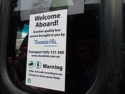 A bus sticker on a Shorelink bus showing the remnants of the TransdevTSL name in September 2014