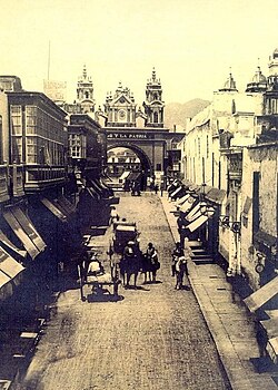 Gate of the colonial wall of Lima, the "Arco del Puente" its partially wooden structures were consumed by a fire caused by street vendors in 1879.[38] The colonial wall of Lima had ten gates,[39][38] now demolished.