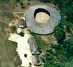 Aerial view of a Yanomami shabono in northern Brazil. Outlying buildings are for the privacy of newlywed couples, or may be used for the preparation of game and fish.