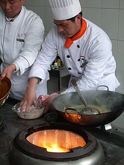 Cooking with a wok in China