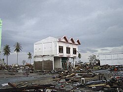 Tsunami inundation height can be seen on a house in Banda Aceh