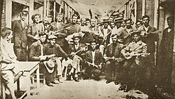 Rebetes in Karaiskaki, Piraeus (1933). Left Markos Vamvakaris with bouzouki.