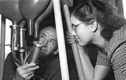 Demonstration of a new Soviet milker device. East Germany, 1952