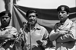 Civil rights activist Cesar Chavez, flanked by Brown Berets, at a 1971 rally during the Chicano movement