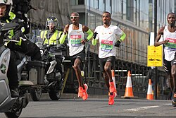 Mo Farah, Abdi and Daniel Wanjiru, The Big Half in London in 2019.