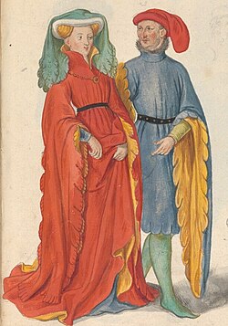 A Flemish lady and gentleman in the year 1400, illustrated in the manuscript "Théâtre de tous les peuples et nations de la terre avec leurs habits et ornemens divers, tant anciens que modernes, diligemment depeints au naturel". Painted by Lucas d'Heere in the 2nd half of the 16th century. Preserved in the Ghent University Library.[10]