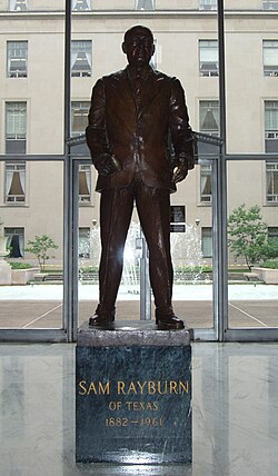 A statue of Rayburn near the ground level courtyard