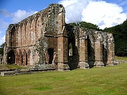 Furness Abbey in Cumbria; dissolved in 1537 and the first of the larger houses to be dissolved by voluntary surrender