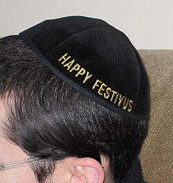 "Happy Festivus" embroidered on a kippah