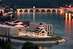 A view towards Andrićgrad and Mehmed Paša Sokolović Bridge in Bosnia and Herzegovina; tourism is a rapidly growing sector of the Bosnian economy[108]