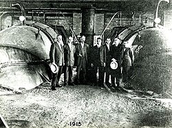A. Baldwin Wood, standing at center, at New Orleans pumping station, 1915