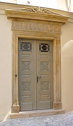 Classicist door in Olomouc, Czech Republic.