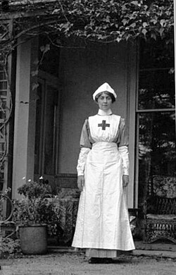 Christie as a nurse in the Voluntary Aid Detachment of the British Red Cross, pictured outside her childhood home of Ashfield in 1915.