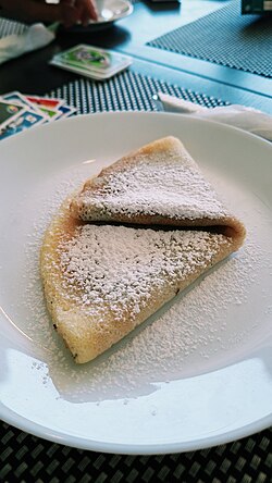 Palacinke, Croatian pancakes, served with powdered sugar in Zagreb, Croatia