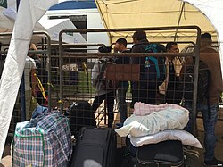 Venezuelan migrants being processed in Ecuador in preparation to make the long journey north to New York City, including crossing the Darién Gap