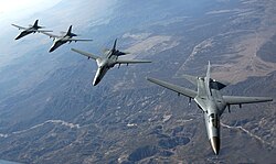Four Australian F-111s flying towards Nellis Air Force Base after a refueling exercise during Exercise Red Flag 2006