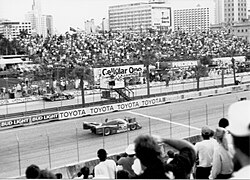 Geoff Brabham in the Nissan NPT-91 about to take the checkered flag at the conclusion of the 1992 Miami Grand Prix on the Bicentennial Park (Now Museum Park (Miami)) circuit.