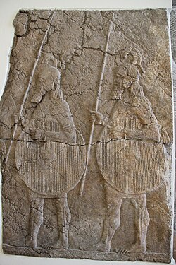 Relief from Sennacherib's palace at Nineveh depicting two Assyrian spearmen