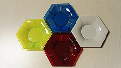 So-called "color chips" or color samples, used in the plastic industry to help designers visually identify available colors of plastic pellets.
