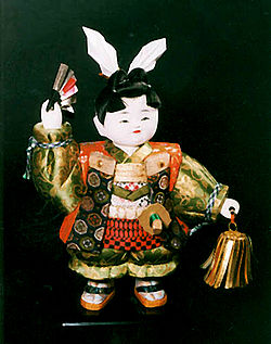 Bisque doll of Momotarō,a character from Japanese literature and folklore