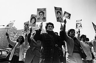 Women of the Association of Families of the Detained-Disappeared demonstrate in front of La Moneda Palace during the Pinochet military regime.
